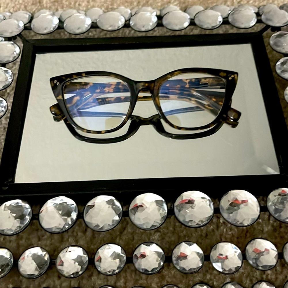 Blue light cat eye shaped tortoise colored glasses.